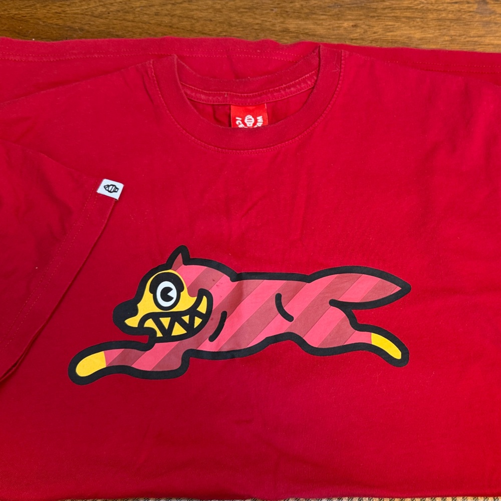 Red Graphic Short Sleeve Tee with Playful Striped Mascot
